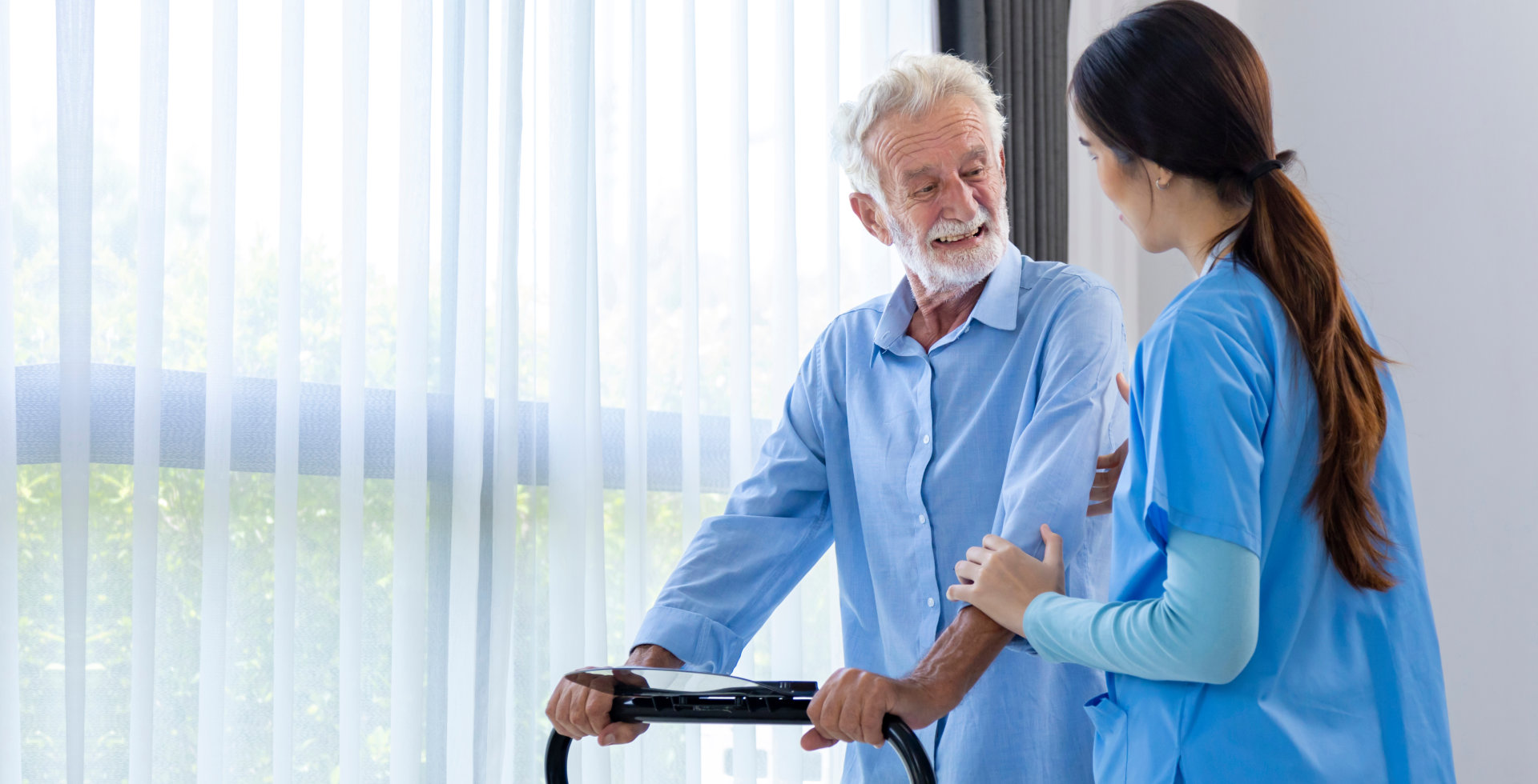 the ederly patient assisted by the home care staff